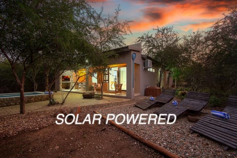 Property building, Patio, BBQ facilities, Dining area, Swimming pool, sunbed, air conditioner