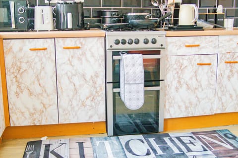 Kitchen or kitchenette, oven, toaster