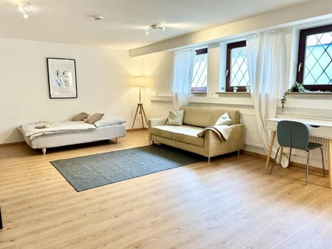 Bed, Living room, Seating area, Bedroom