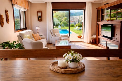 Natural landscape, Living room, Seating area, Garden view, Swimming pool