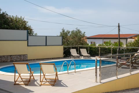 Patio, Pool view, Swimming pool, sunbed