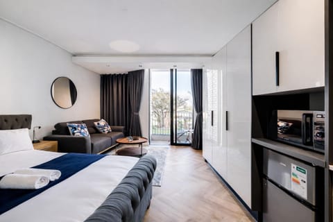 Bed, Living room, Seating area, Bedroom