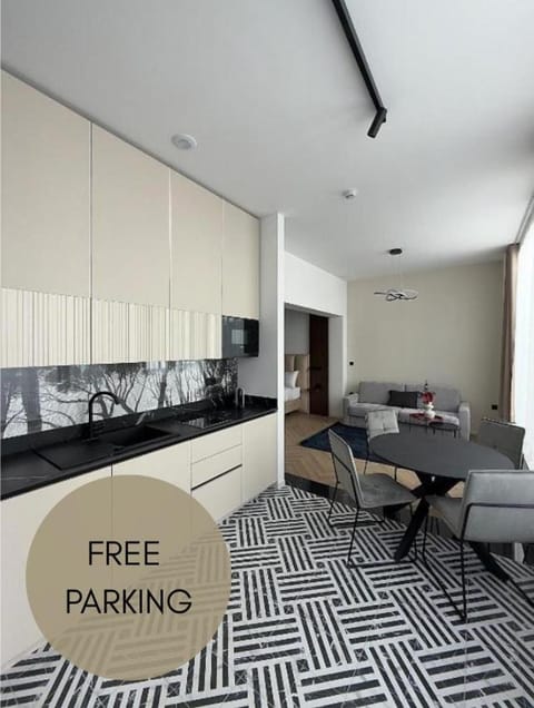 Kitchen or kitchenette, Living room, Seating area, Dining area
