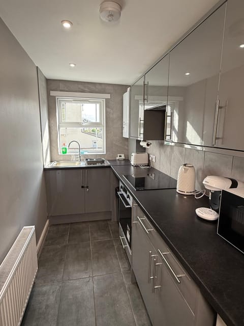 Kitchen or kitchenette, stove