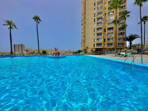 Property building, Pool view, Swimming pool, sunbed