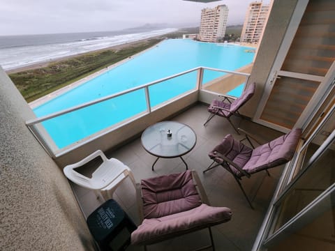 Day, Balcony/Terrace, Living room, Seating area, Pool view, Sea view, Swimming pool