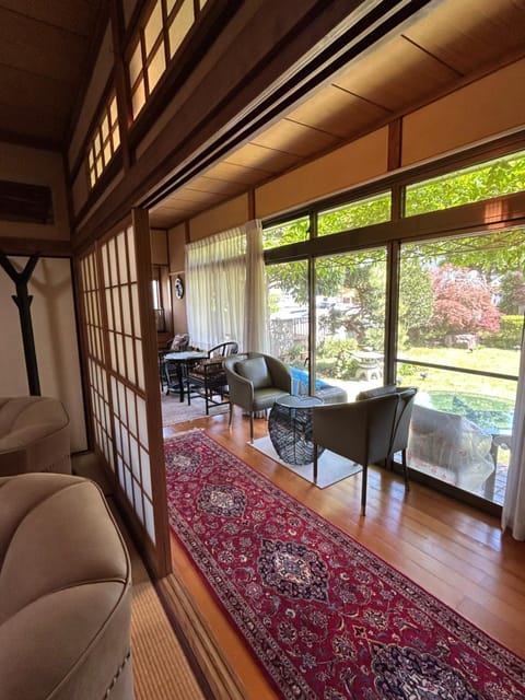 Living room, Seating area, Garden view