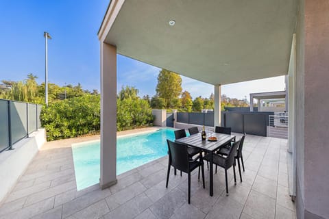 Patio, Dining area, Swimming pool