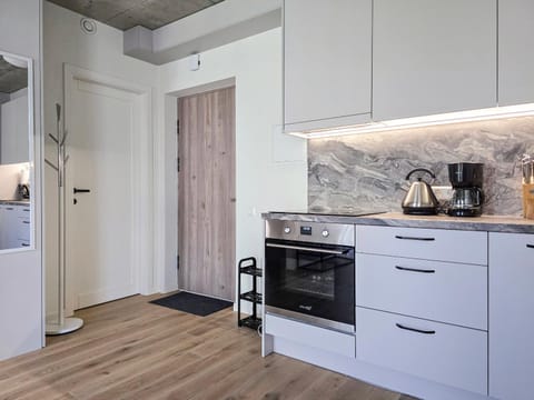 Kitchen or kitchenette, oven, stove