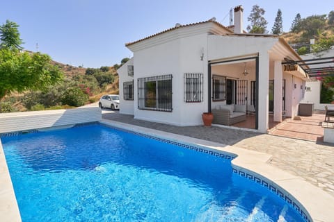 Property building, Living room, Swimming pool