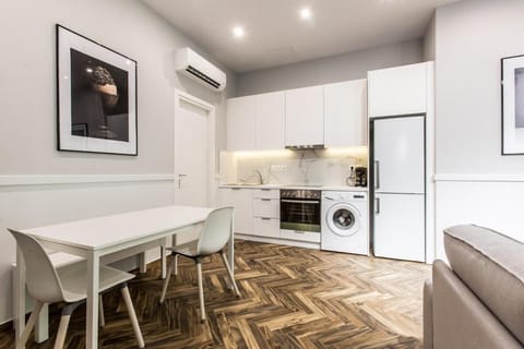 Seating area, Dining area, minibar, oven, washing machine, air conditioner