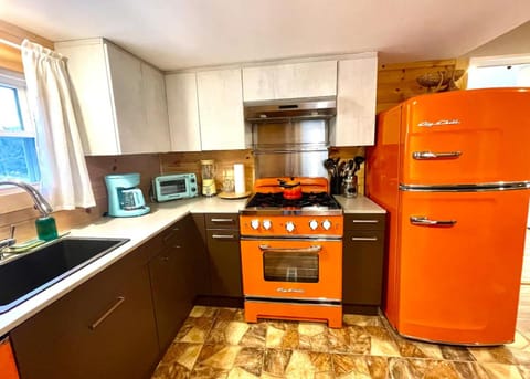 Kitchen or kitchenette, dishwasher, oven, stove, toaster