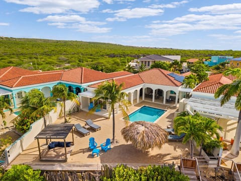 Property building, Patio, Pool view, Swimming pool, sunbed