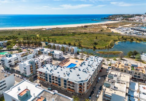 Property building, Nearby landmark, Beach, Sea view, Street view, Swimming pool
