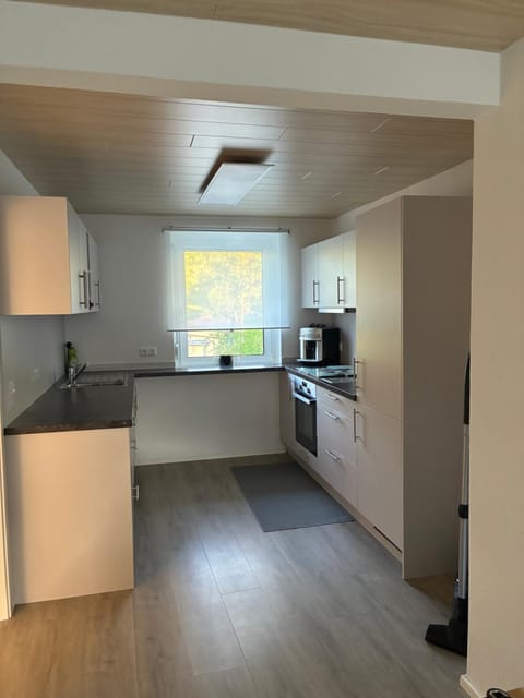 Kitchen or kitchenette, dishwasher, oven, stove, toaster