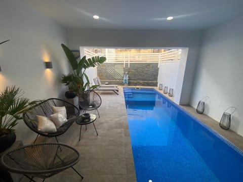 Seating area, Pool view, Swimming pool, sunbed