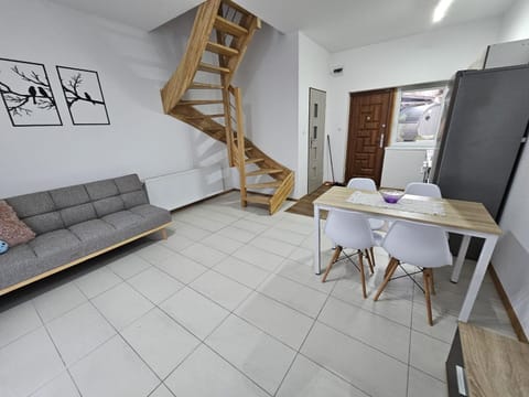 Kitchen or kitchenette, Living room, Seating area, Dining area