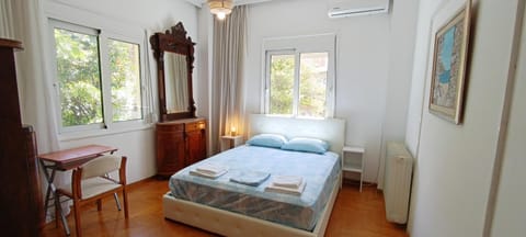 Bed, Photo of the whole room, Bedroom, towels, air conditioner