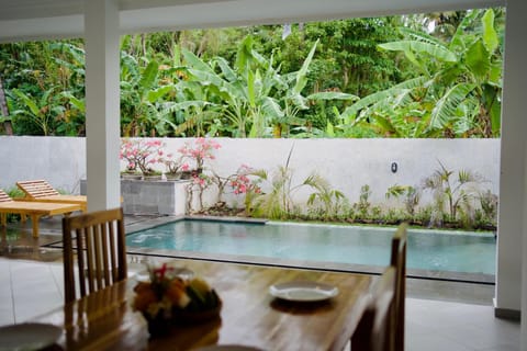 Patio, Day, Natural landscape, Garden, Dining area, Garden view, Pool view, Swimming pool, sunbed