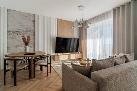 Bed, TV and multimedia, Living room, Seating area, Dining area