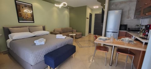 TV and multimedia, Kitchen or kitchenette, Seating area, Bedroom, towels, air conditioner
