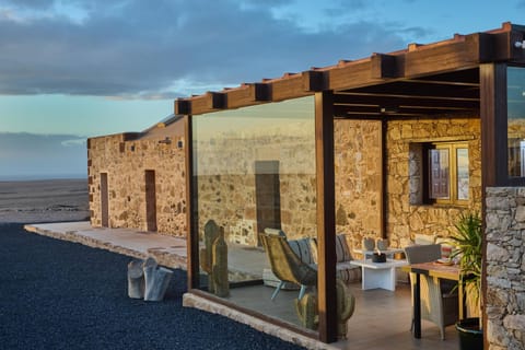 Property building, Patio, Natural landscape, View (from property/room), Dining area, Sea view