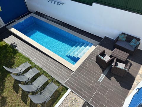 Swimming pool, sunbed