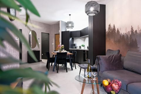 Kitchen or kitchenette, Living room, Seating area, Dining area