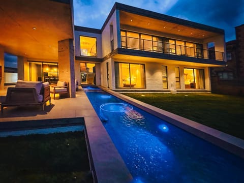 Property building, Night, Pool view, Swimming pool