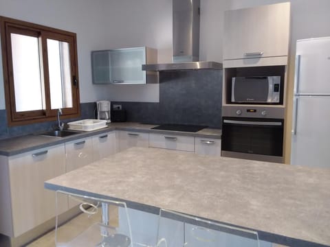 Kitchen or kitchenette, oven, stove, toaster