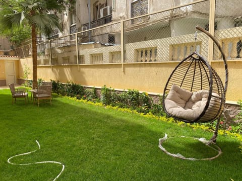 Property building, Patio, Spring, Day, Natural landscape, Garden, Living room, Seating area, Garden view