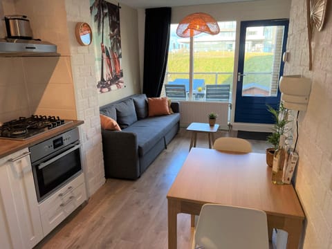 Kitchen or kitchenette, Living room, Seating area, stove