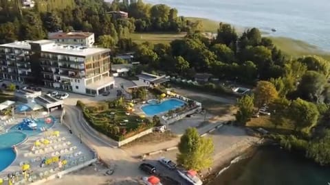 Property building, Nearby landmark, Natural landscape, Beach, Swimming pool, Parking
