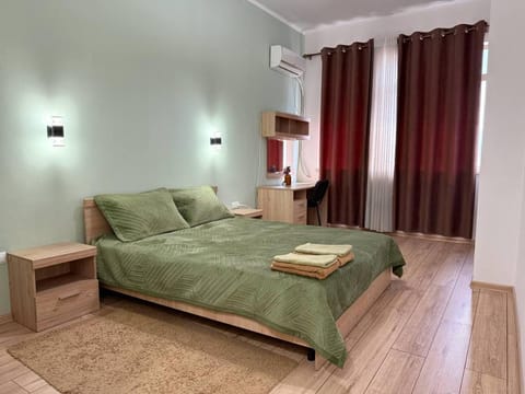 Bed, Photo of the whole room, Bedroom, towels, air conditioner
