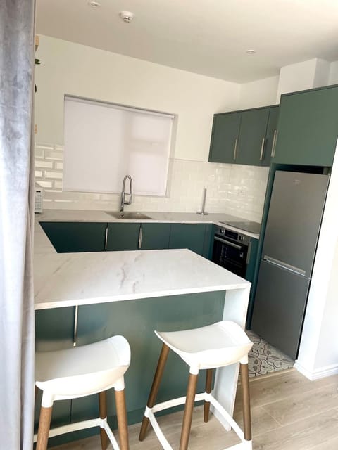 Kitchen or kitchenette, oven