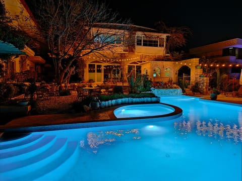 Property building, Night, Pool view, Swimming pool