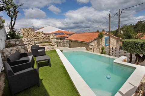 Property building, Living room, Swimming pool