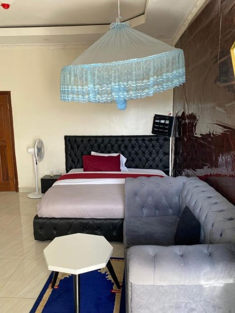 Bed, Seating area, Bedroom