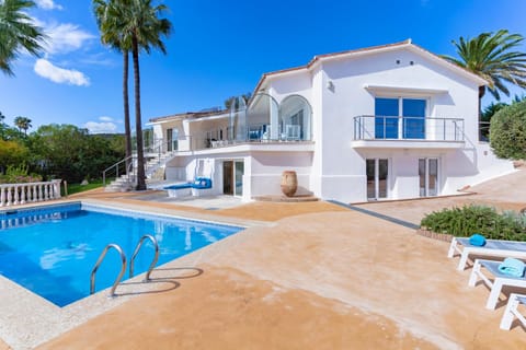 Property building, Patio, Pool view, Swimming pool, sunbed