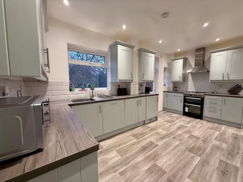 dishwasher, microwave, oven, stove, washing machine, dryer, kitchen