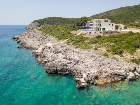 Property building, Natural landscape, Beach, Sea view