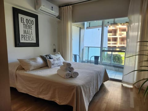 Bed, Photo of the whole room, Bedroom, towels, air conditioner