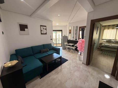 Bed, TV and multimedia, Kitchen or kitchenette, Living room, Photo of the whole room, Seating area, Bedroom