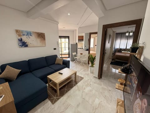 Bed, TV and multimedia, Living room, Photo of the whole room, Seating area, Bedroom