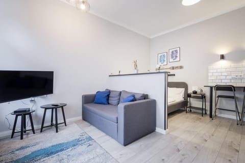 Bed, TV and multimedia, Living room, Seating area, Dining area