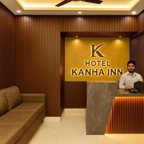 Communal lounge/ TV room, People, Property logo or sign, Living room, Seating area, Evening entertainment, Logo/Certificate/Sign, Text overlay, group of guests, Certificate/Award