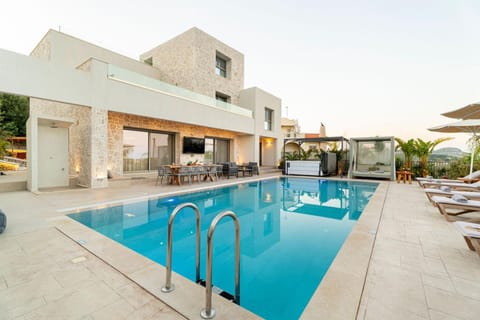 Property building, Patio, Pool view, Swimming pool, sunbed