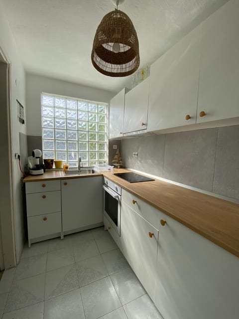 Kitchen or kitchenette, stove