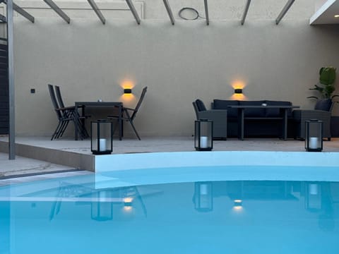 Patio, Living room, Seating area, Pool view, Swimming pool, Swimming pool, sunbed