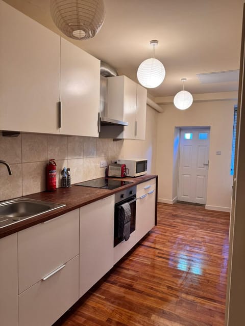 Kitchen or kitchenette, oven, stove, toaster